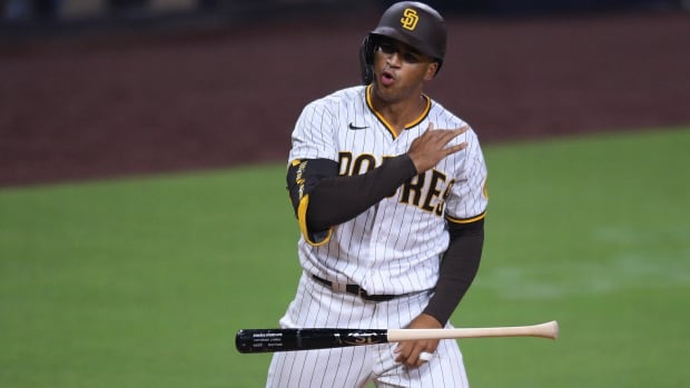 Sep 14, 2020; San Diego, California, USA; San Diego Padres center fielder Trent Grisham (2) tosses his bat after hitting a home run during the sixth inning against the Los Angeles Dodgers at Petco Park. Mandatory Credit: Orlando Ramirez-USA TODAY Sports